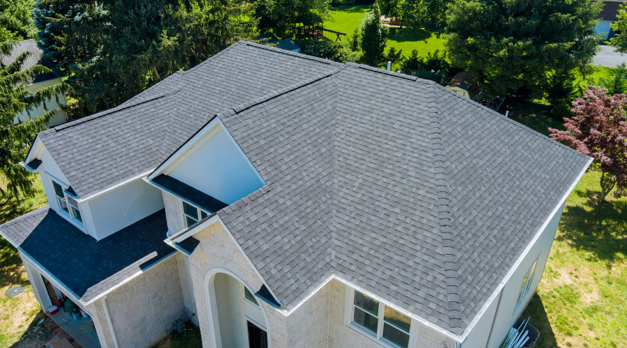 aerial view of a house with shingle roof installed